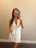 THE HALTER DENIM ROMPER